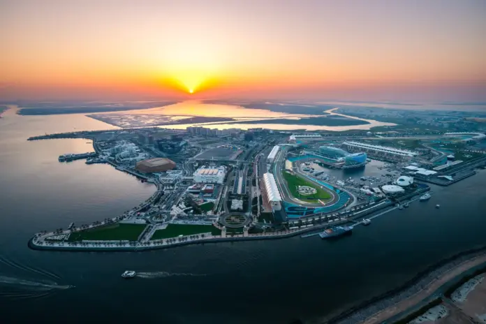 Aerial view of Yas Island and its waterfront at sunset.